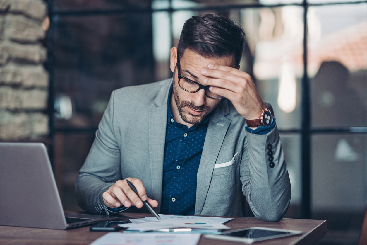 Worried businessman working in the office